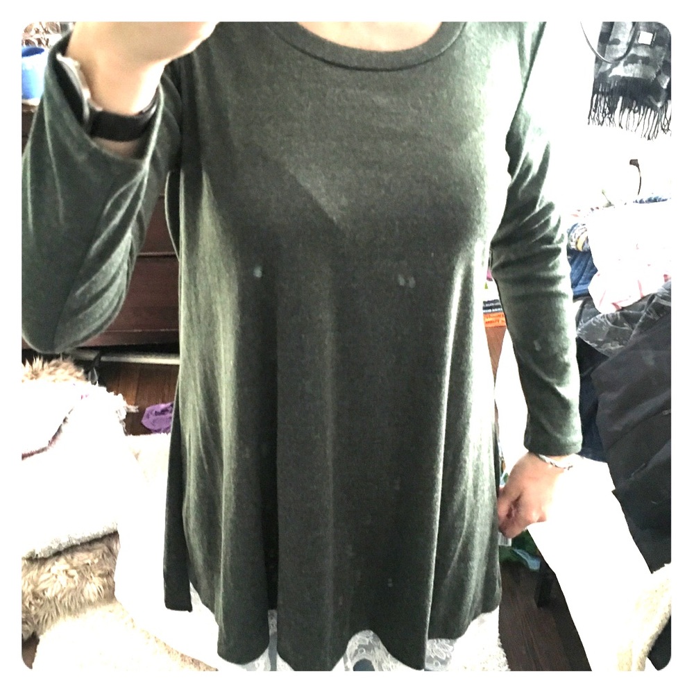 Green women’s tunic with white lace